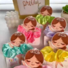Moñitos para el cabello con tarjeta personalizada