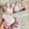 Moñitos para el cabello con tarjeta personalizada
